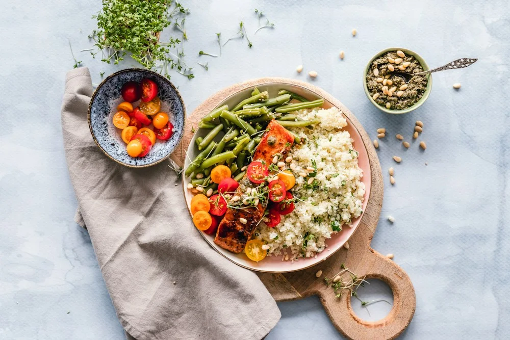 Colourful dishes laid out for a shared meal